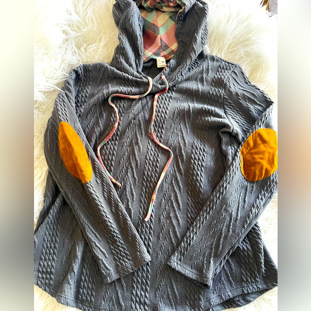 Grey knit looking hoodie with plaid detail